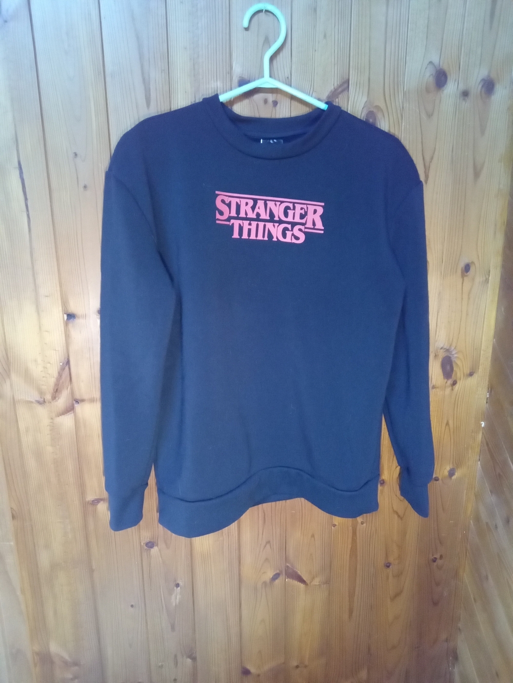 Stranger Things Black Crewneck Sweatshirt with Red Logo
